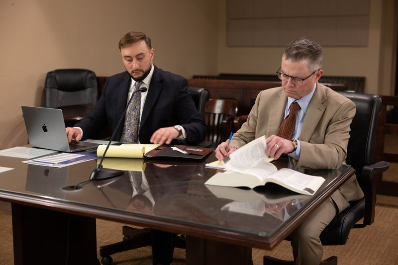 Two lawyers working together