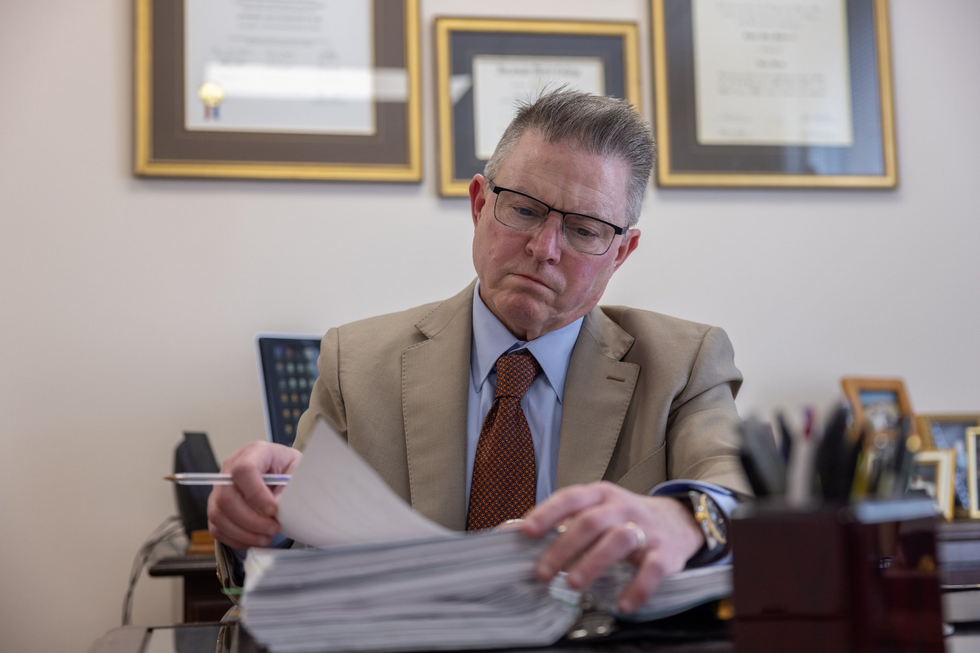 A lawyer in his office