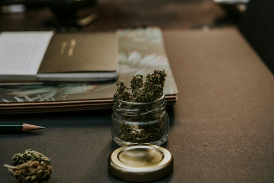 A glass container on a table.