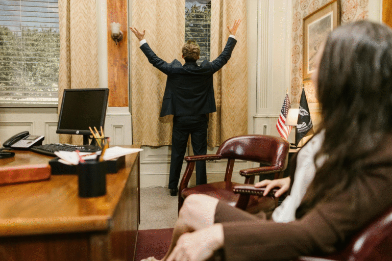 man-office - Law Office of Robert M. Maurer II & Associates - Law Office of Robert M. Maurer II & Associates A photo showing a person standing in an office
