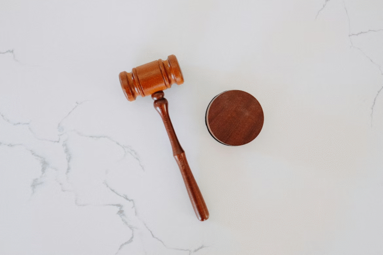 object-on-white-surface.jpg - Law Office of Robert M. Maurer II & Associates - Law Office of Robert M. Maurer II & Associates Object placed on a white surface in a minimal setting